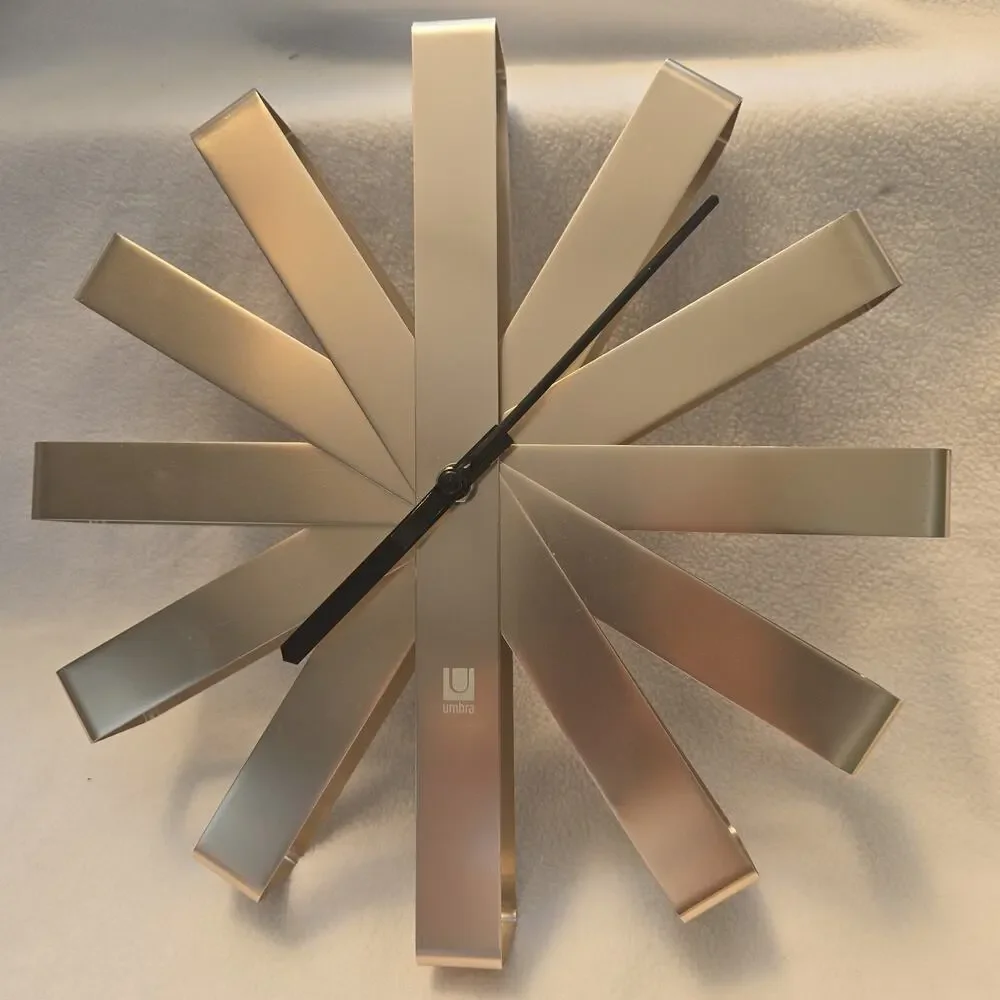 Stainless Steel Umbra Mid Century Modern Asterisk Wall Clock